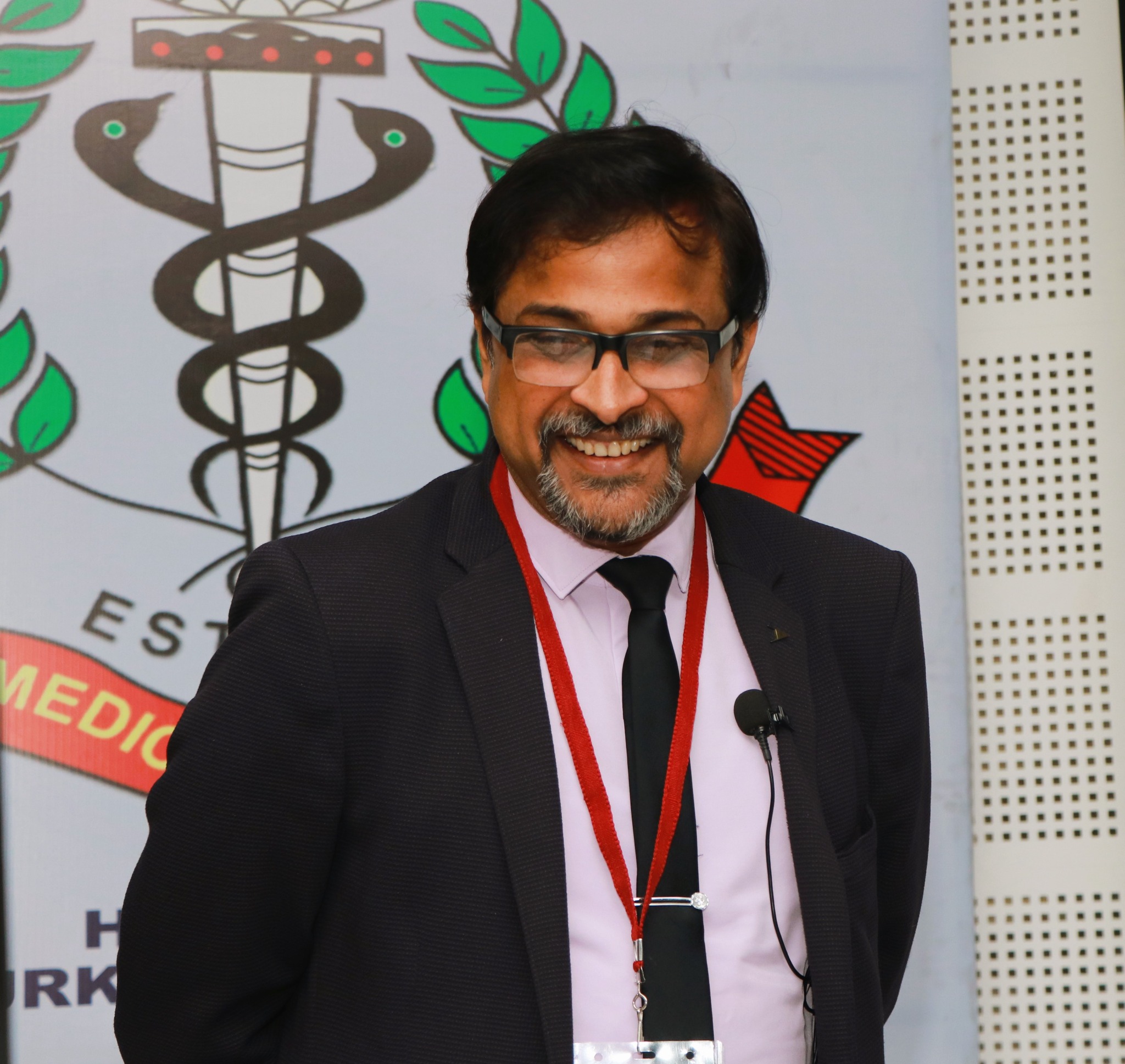 Dr Biswajit Mohapatra speaking at an Indian Medical Association event